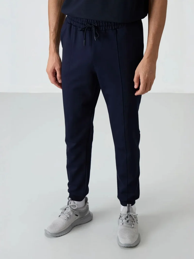 تومي لايف TOMMY Men's Fleece Jogger Sweatpants