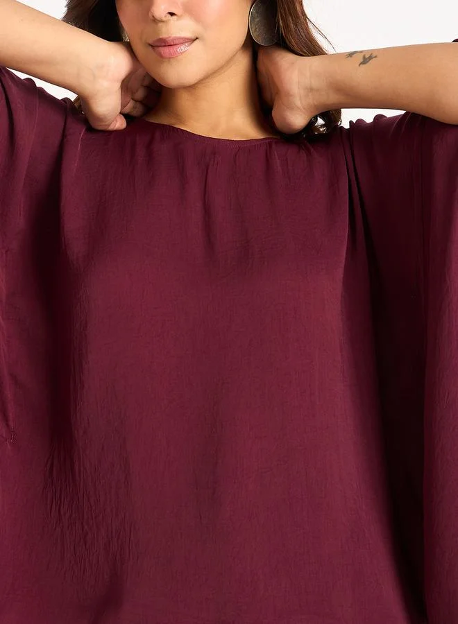 Femmella Femmella Asymmetric Hem Round Neck Satin Top