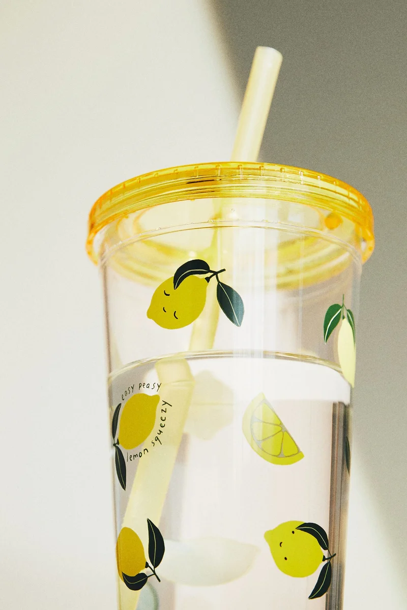 H&M Patterned plastic mug with a straw