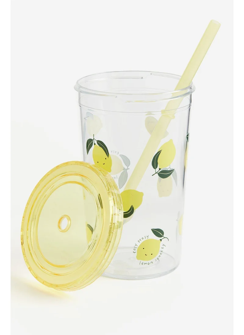 H&M Patterned plastic mug with a straw