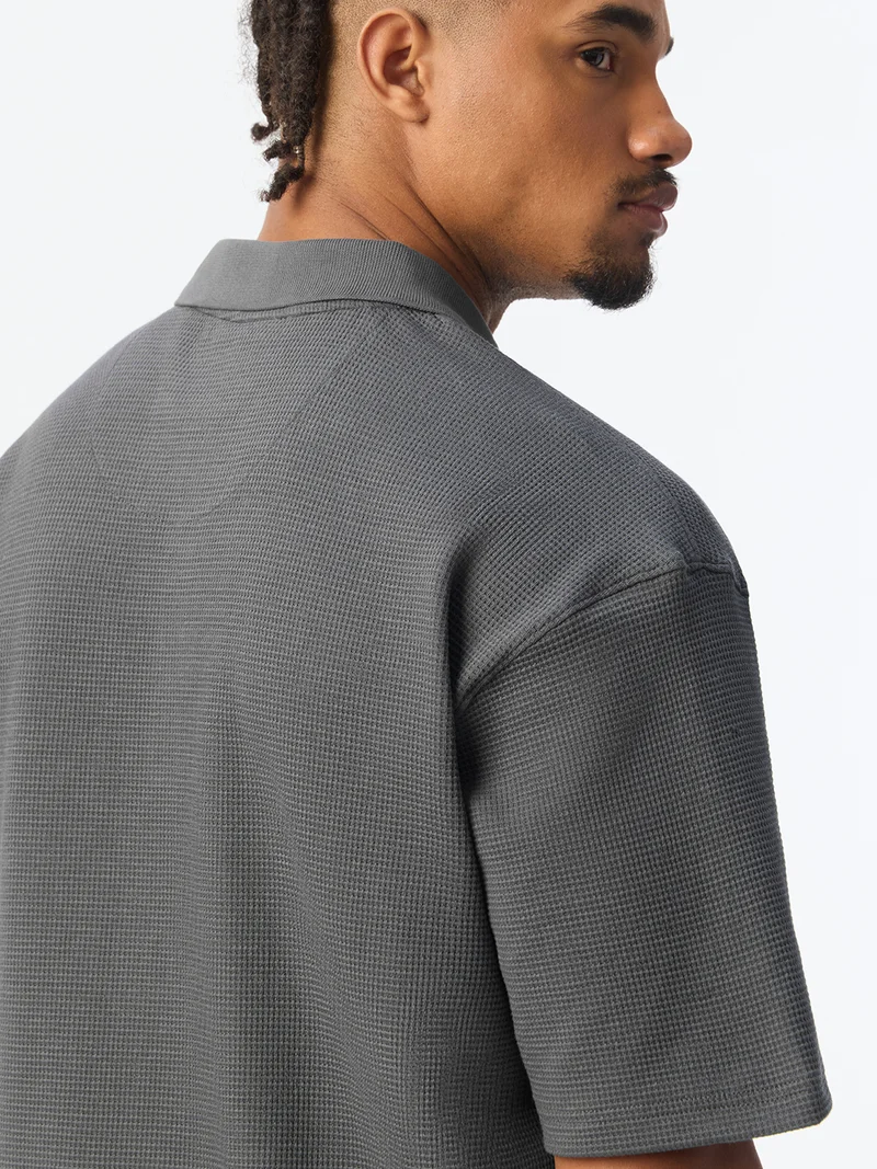 The Souled Store  The Souled Store: Storm Men and Boys Short Sleeve Spread Collar Dark Grey Embroidered Cotton Blend Oversized Fit Waffle Textured Modern Streetwear Everyday Polo Shirts  | Best Price UAE