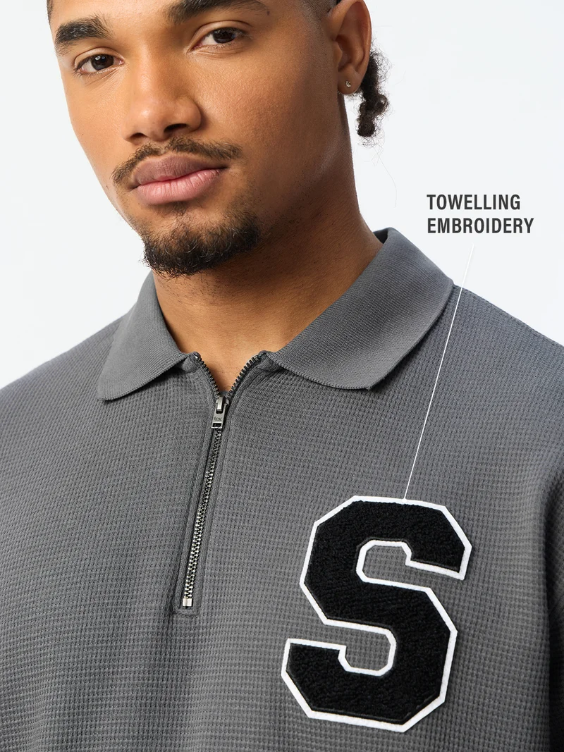 The Souled Store  The Souled Store: Storm Men and Boys Short Sleeve Spread Collar Dark Grey Embroidered Cotton Blend Oversized Fit Waffle Textured Modern Streetwear Everyday Polo Shirts  | Best Price UAE