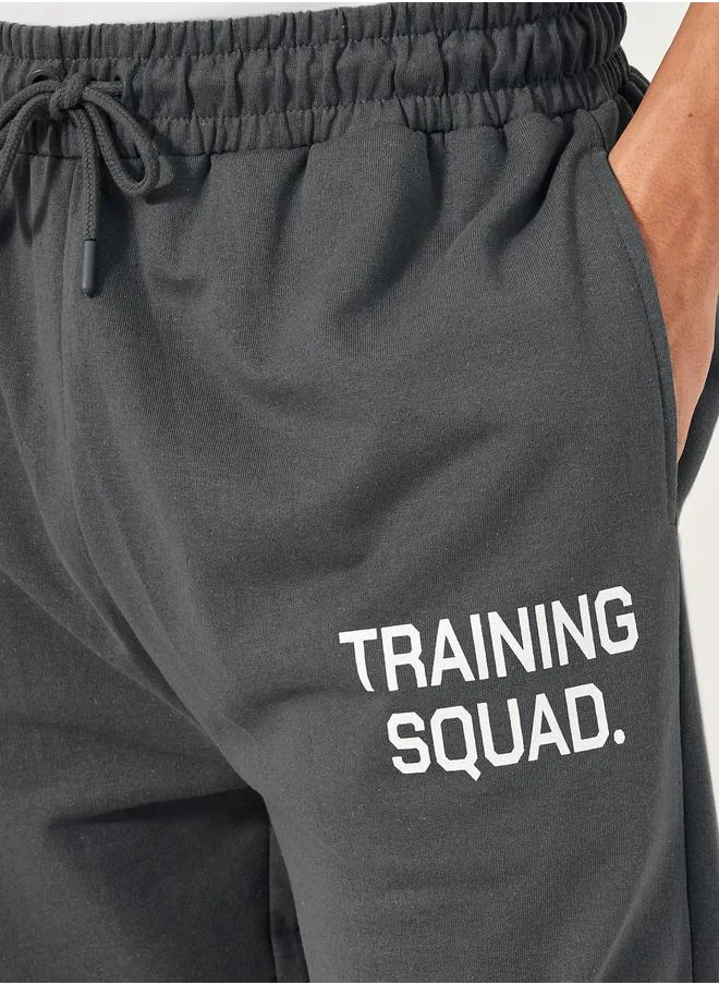 Styli Styli Eco Earth Slogan Print Oversized Training Joggers