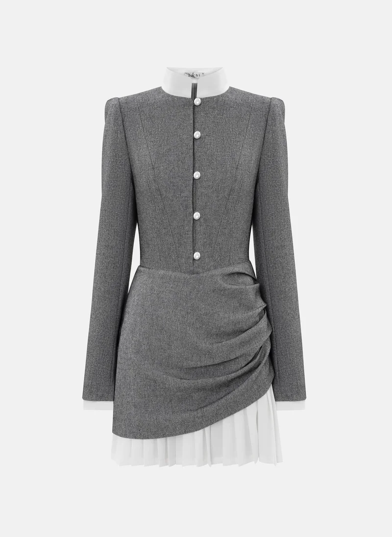 Lichi Mini dress with a pleated skirt and pearl buttons