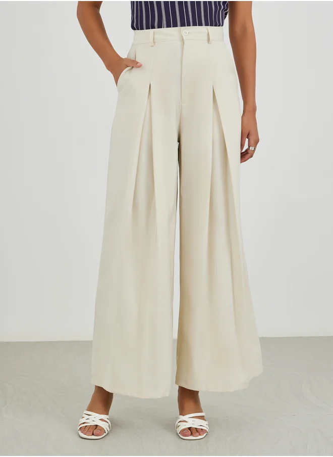 ستايلي Styli Solid High Rise Inverted Pleated Wide Leg Pants
