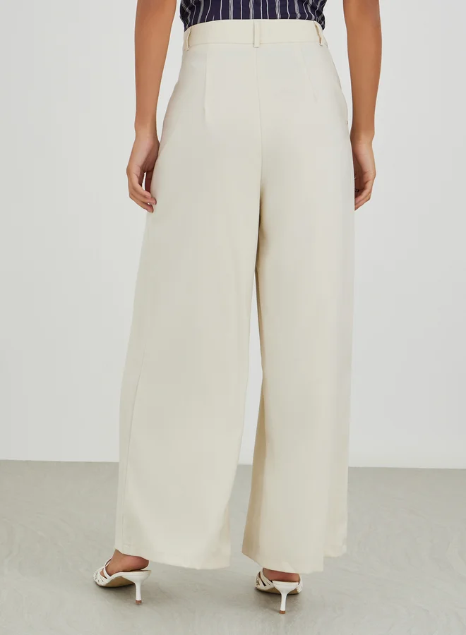 Styli Styli Solid High Rise Inverted Pleated Wide Leg Pants