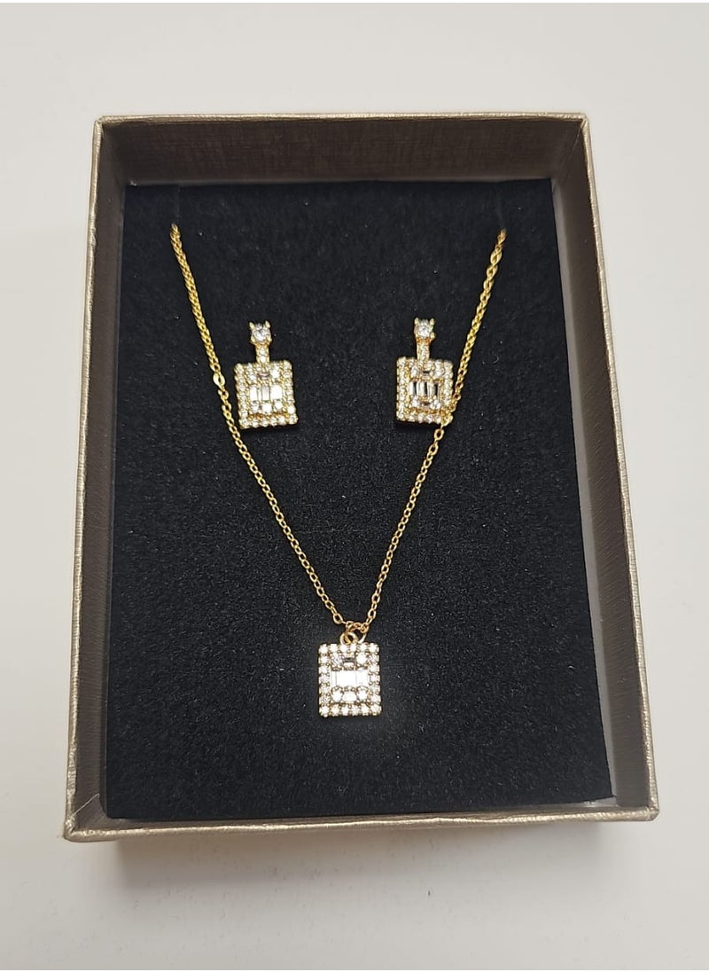 Women's accessory set consisting of earrings and a chain made of zircon