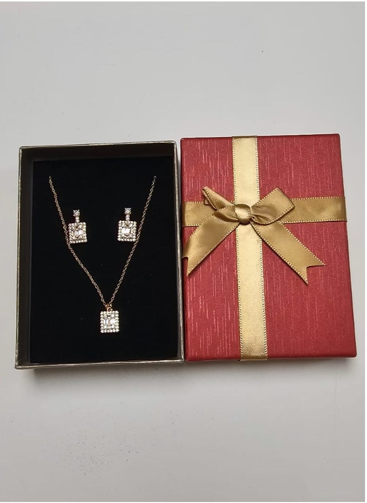 Women's accessory set consisting of earrings and a chain made of zircon