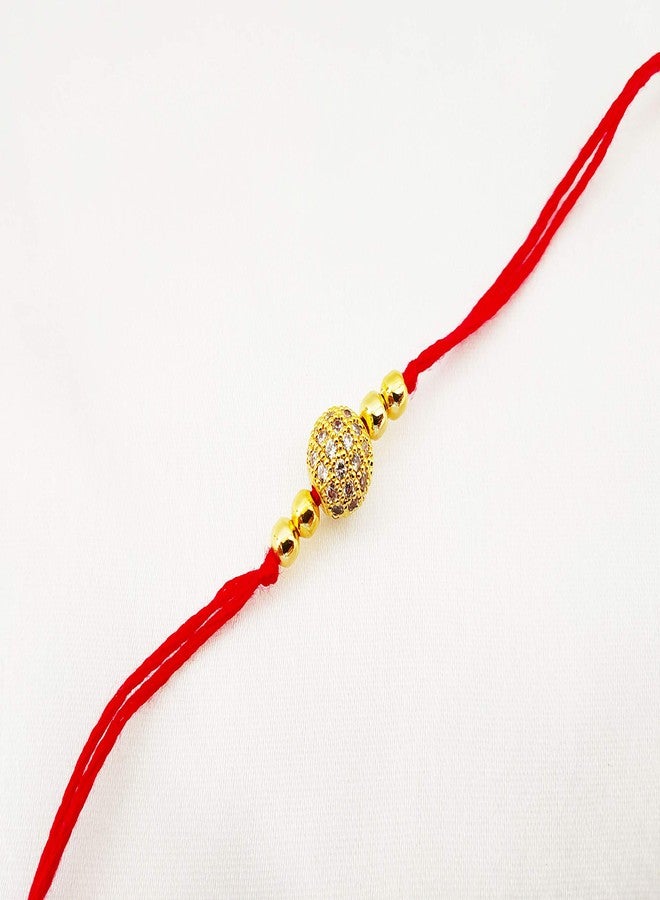 JHB Gold Plated American Diamond Finished CZ Diamond Boll With Golden Beads Rakhi For Men - Image 2