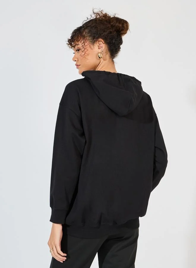 Styli  Oversized Zip Through Hoodie with Badge Detail for Women | Best Price UAE