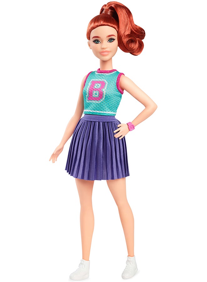 Barbie Fashionistas Doll #232 with Red Hair, Wearing Sporty “B” Jersey Top and Pleated Purple Skirt with Watch and Sneakers​​ - Image 1