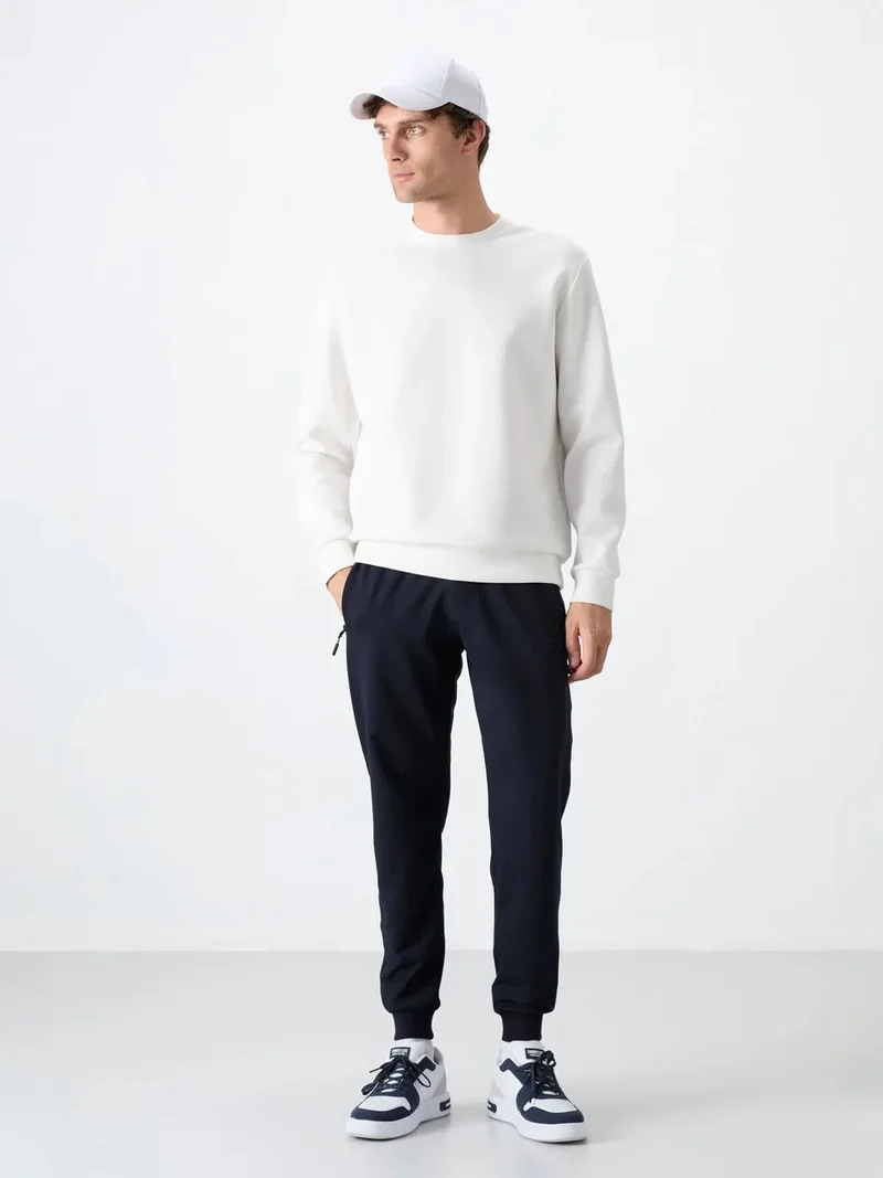 تومي لايف TOMMY Men's Solid Pull-on Sweatpants With Zip Pocket
