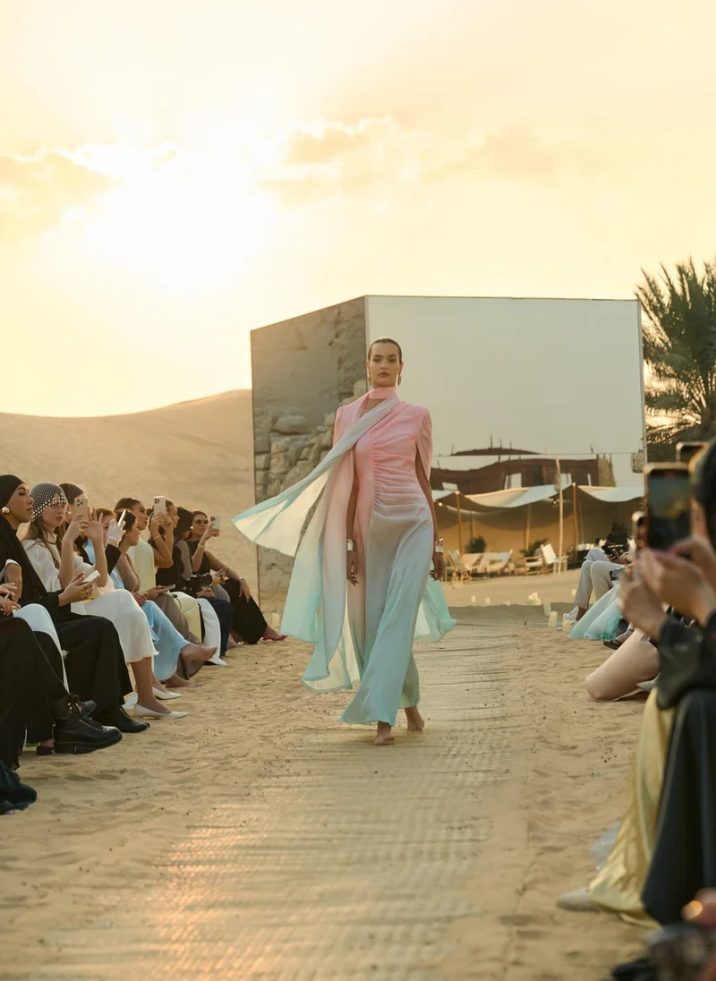 Lichi Maxi dress with asymmetric neckline and rhinestone embellishment on the sleeves