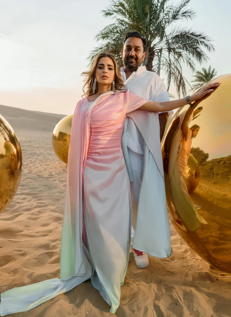 Lichi Maxi dress with asymmetric neckline and rhinestone embellishment on the sleeves