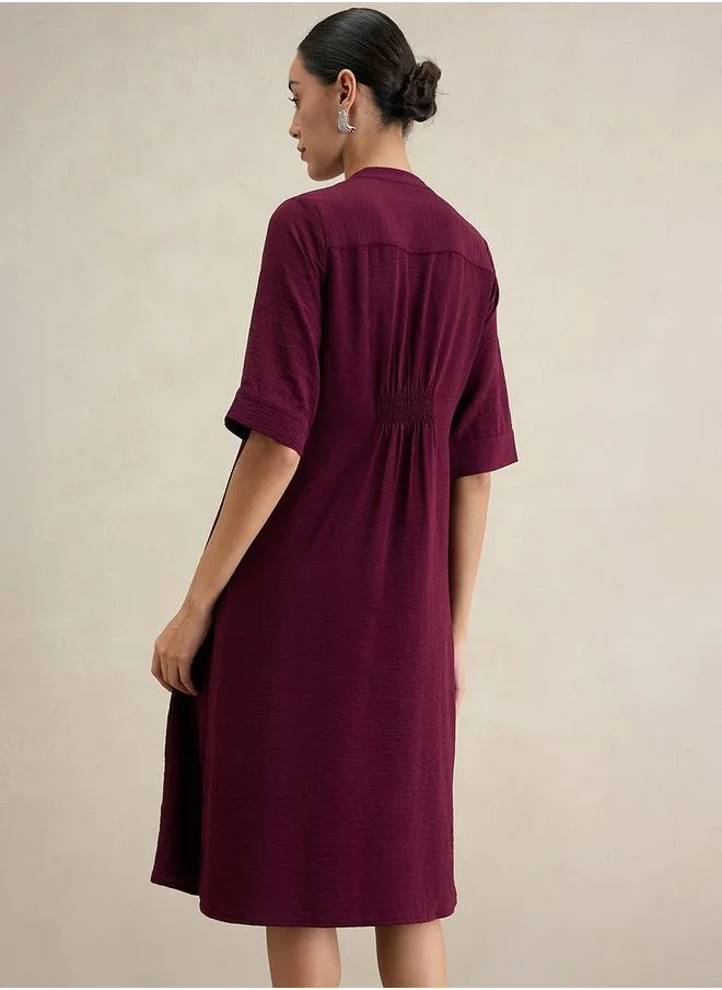 Femmella Solid Notch Neck A-Line Midi Dress by Styli