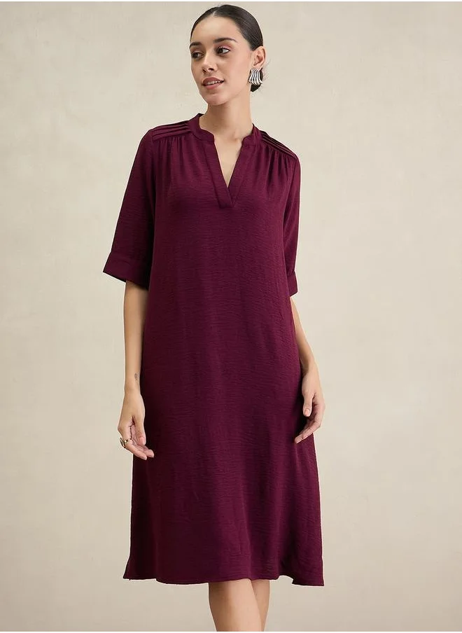 Femmella Solid Notch Neck A-Line Midi Dress by Styli