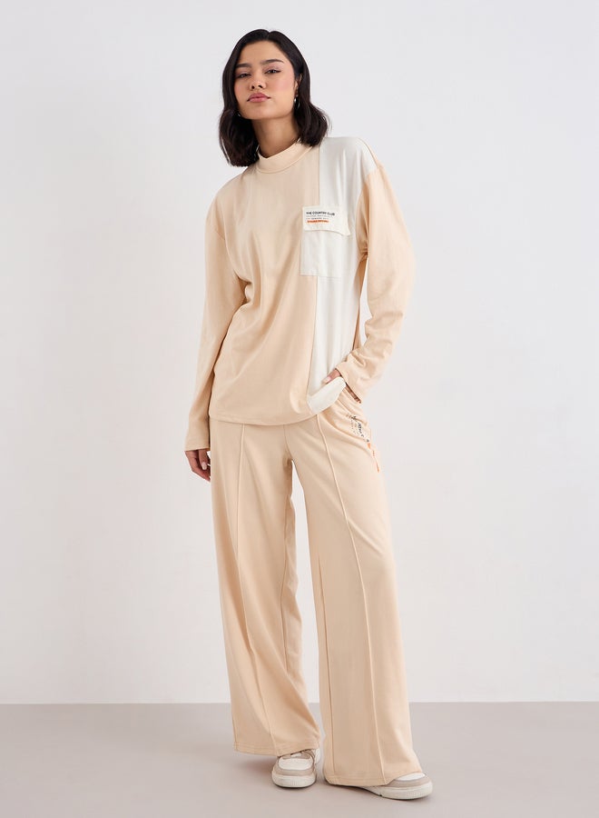 ستايلي طقم منسق من جوغر وتيشيرت بتفاصيل مُتباينة - Image 2