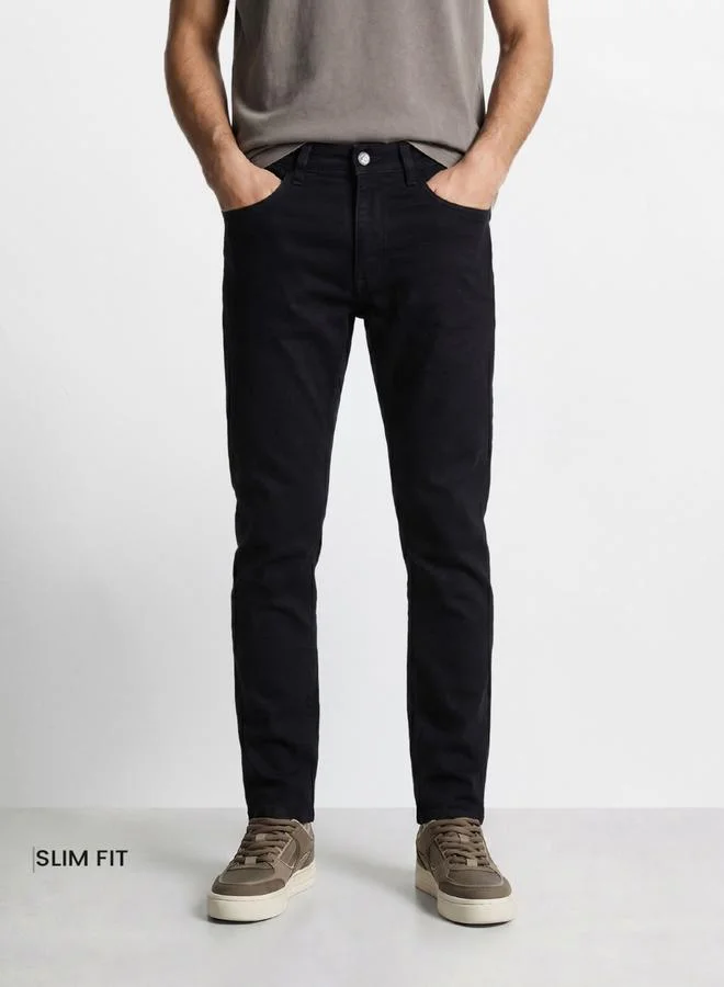 ذا انديان كراج كو Men Slim Fit Solid Jeans