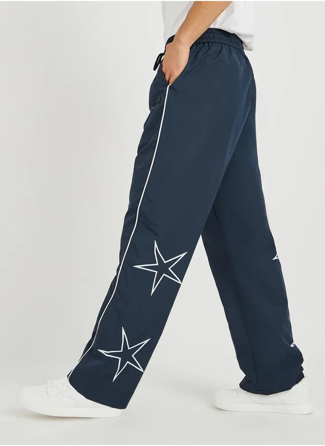 Styli Styli Star Printed Oversized Open Hem Joggers with Piping Detail