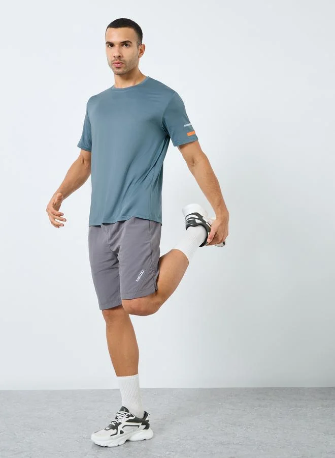 Styli  Styli Regular Fit Crew Neck Athleisure T-Shirt for Men | Best Price UAE