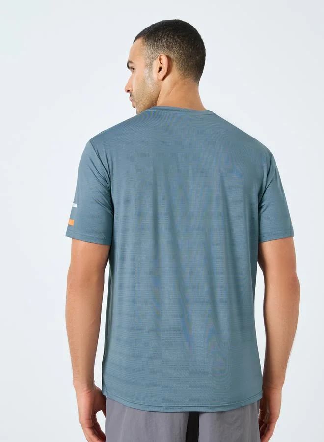 Styli  Styli Regular Fit Crew Neck Athleisure T-Shirt for Men | Best Price UAE