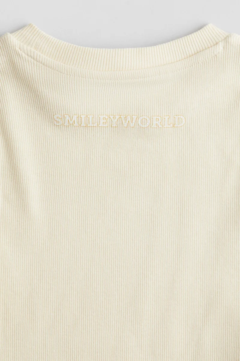 اتش اند ام بلوزة قطنية بطبعة