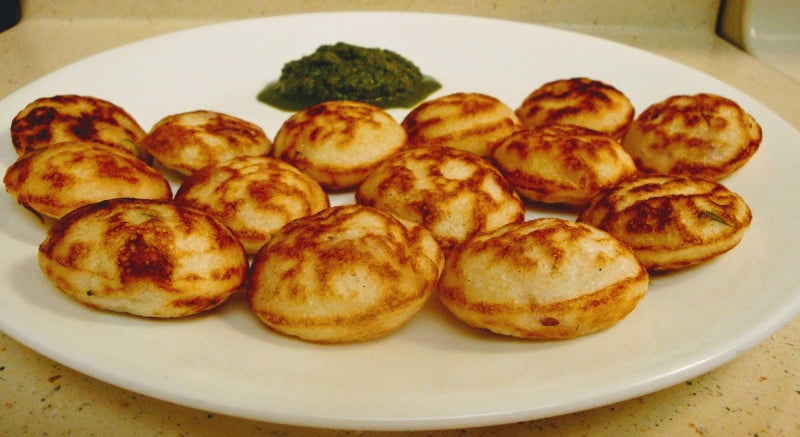 Bharath Agencies 12 Cavity Appam Patra Kuzhi Paniyaram Pre-Seasoned Cast Iron Paddu Tawa with Sesame Oil, Brown, Each Hole - 2 inch in Diameter - Image 3