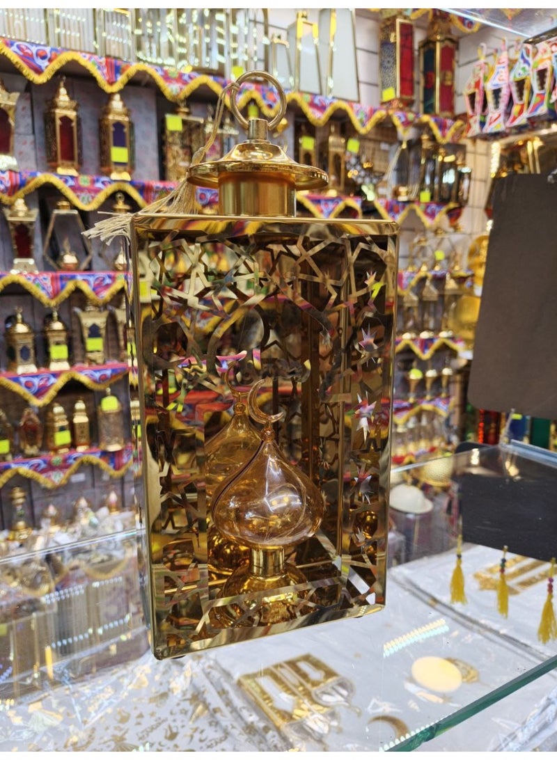 Fatimid-era metal lantern with traditional design and bulb – Ramadan decoration with warm lighting