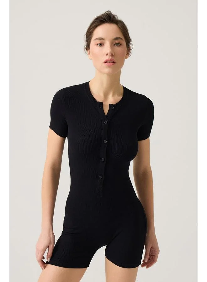 Los Ojos Black Ribbed Short‑Sleeve Short Jumpsuit (Short Romper).