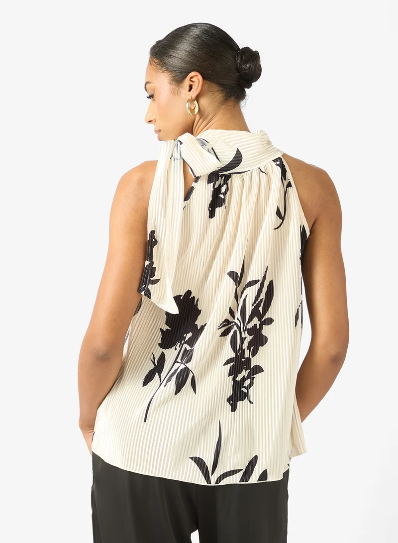 ايلا بلوزة بياقة هالتر مطبوعة