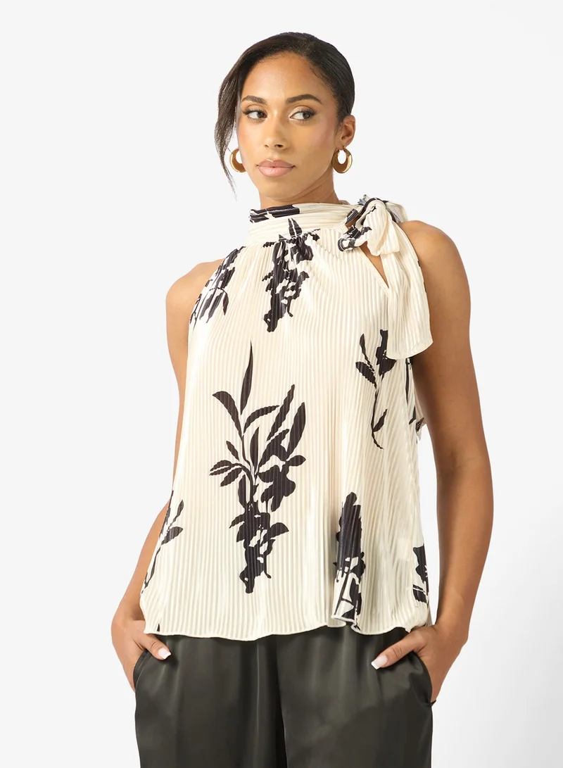 ايلا بلوزة بياقة هالتر مطبوعة