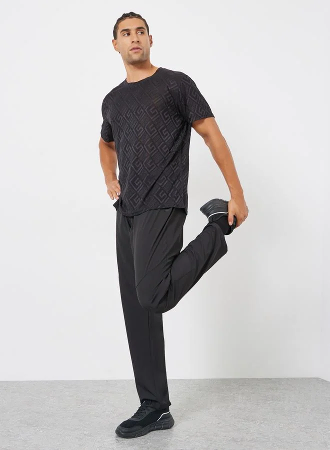 ستايلي اكتيف تيشيرت رياضي سريع الجفاف بطبعة هندسية