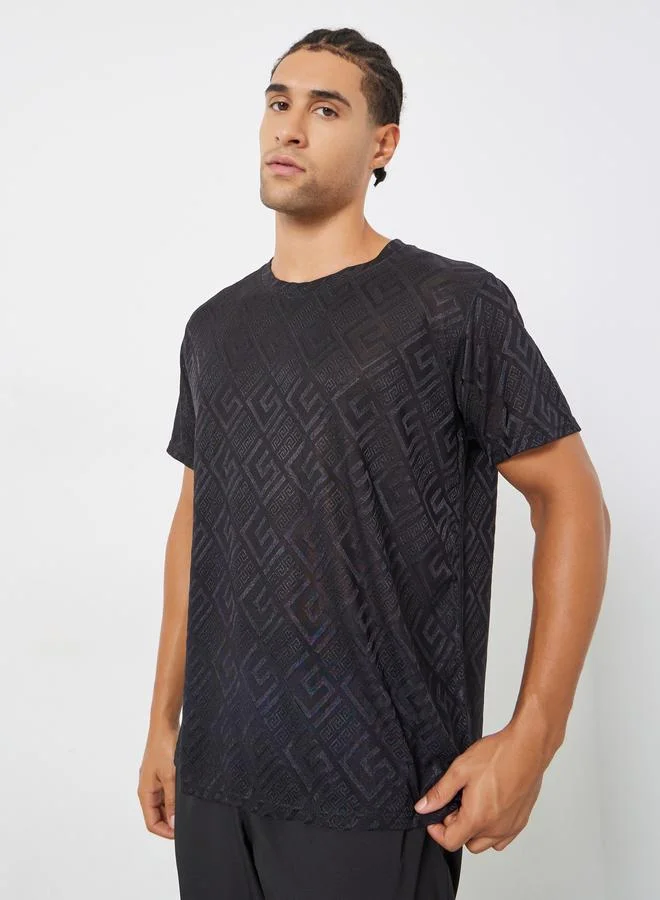 ستايلي اكتيف تيشيرت رياضي سريع الجفاف بطبعة هندسية