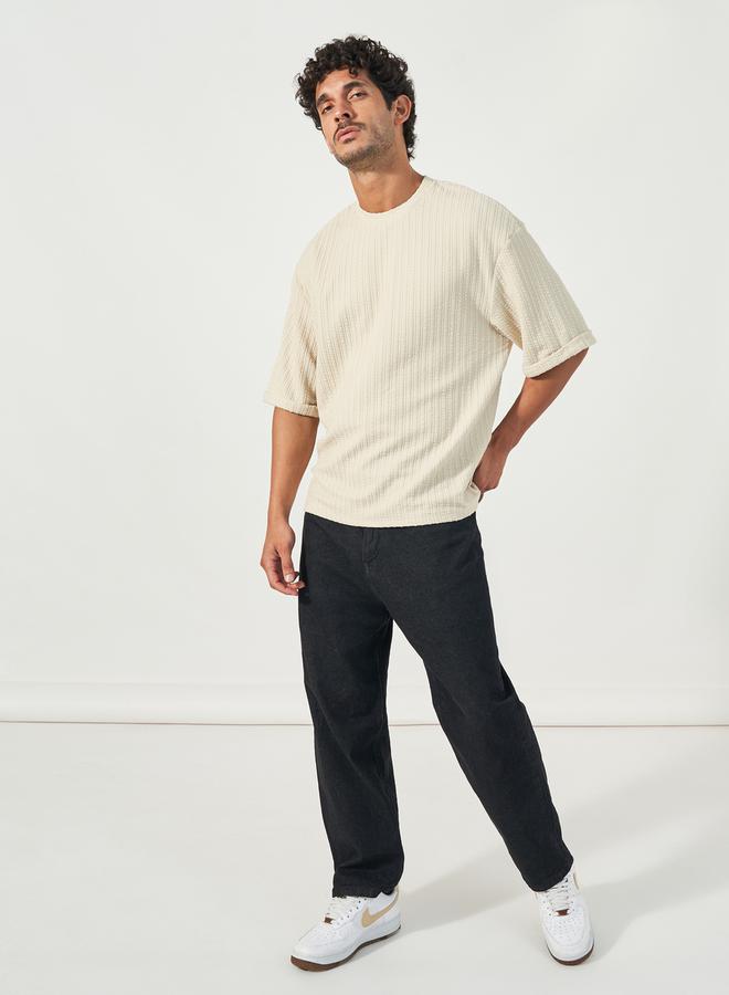 Styli Seersucker Textured Knit Boxy Fitted T-Shirt with Turn-Up Sleeves  - Image 2