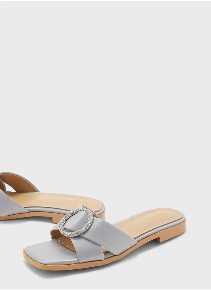 Khizana Encrusted Buckle Satin Flat Sandal