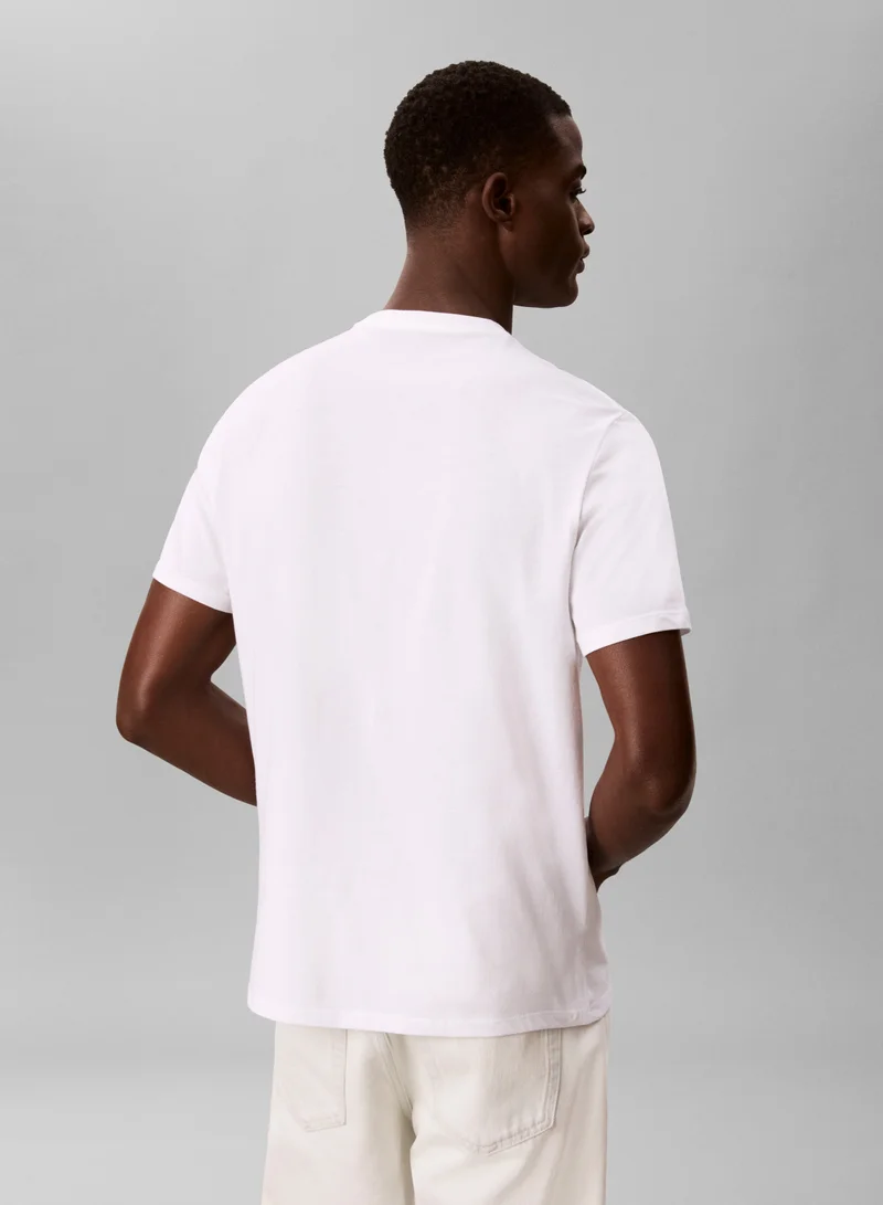 Calvin Klein Jeans  1968 Logo Graphic Crew Neck T-Shirt for Men | Best Price UAE