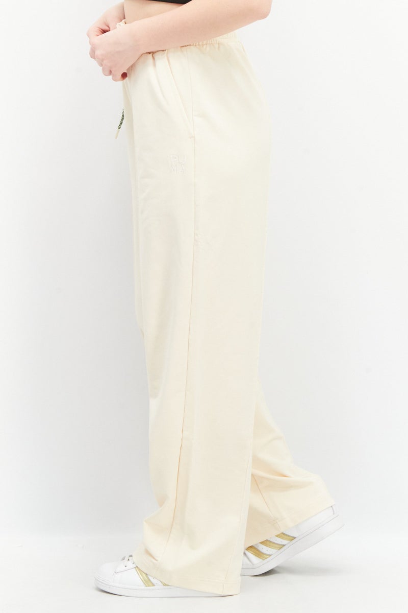 PUMA Women Sportswear Fit Embroidered Infuse Paperbag Outdoor Pants, Beige - Image 3