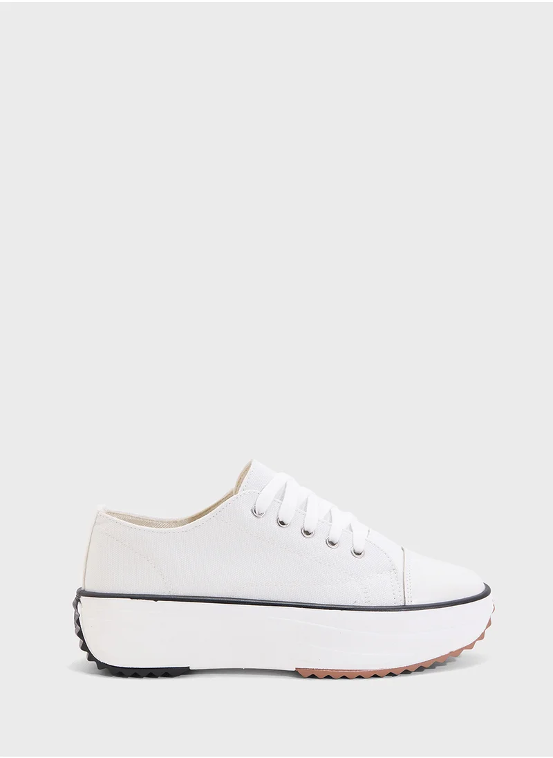 جينجر Canvas Lace Up Platform Sneaker