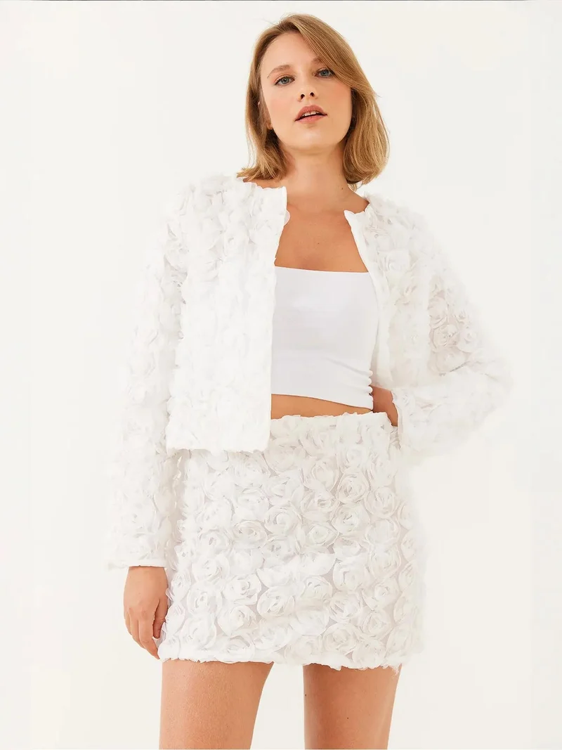 Bianco Lucci White LUCCI Lace Textured Mini Skirt with Flower Pattern for Women | Best Price UAE