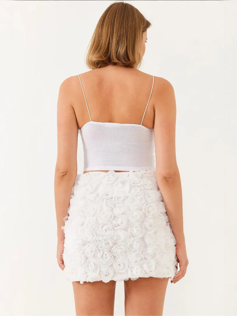 Bianco Lucci White LUCCI Lace Textured Mini Skirt with Flower Pattern for Women | Best Price UAE