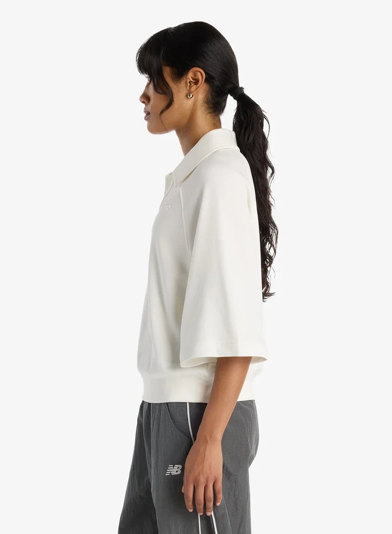 New Balance  Coastal Fleece Oversized Polo for Women | Best Price UAE