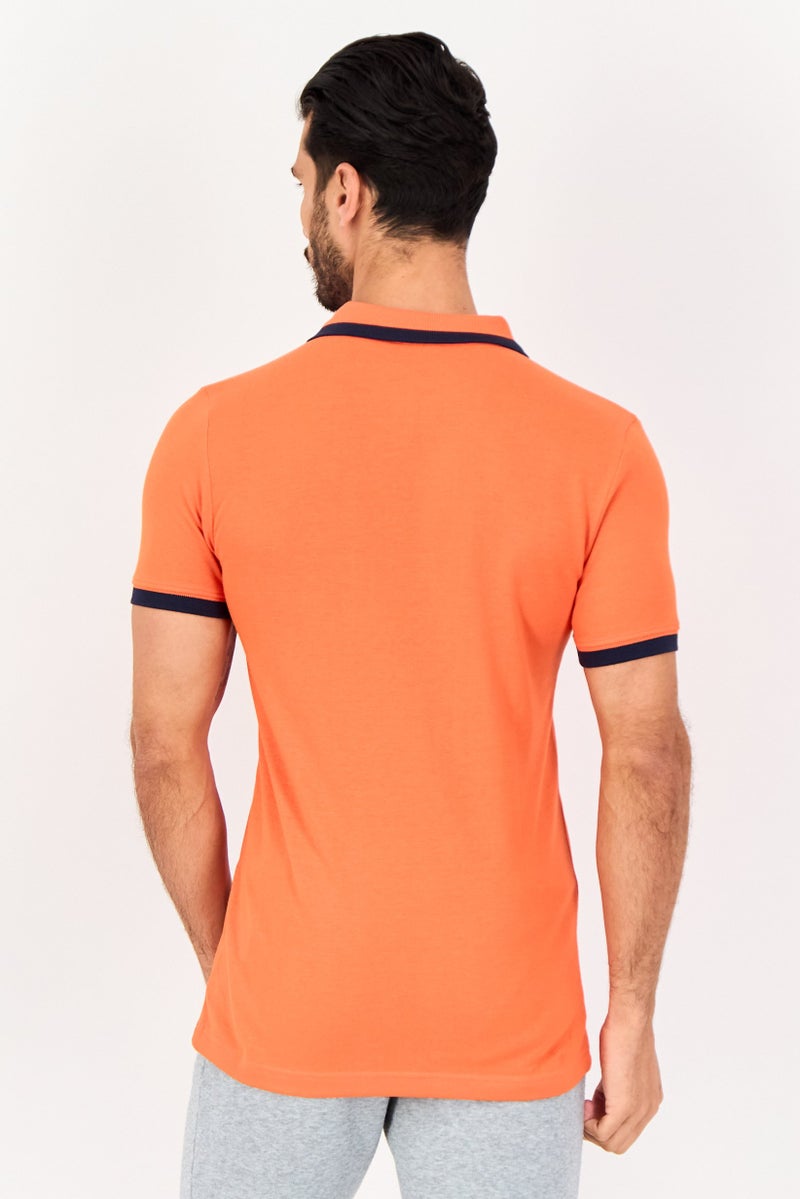 PUMA Men Slim Fit Brand Logo Short Sleeves Outdoor Polo Shirt, Orange - Image 4