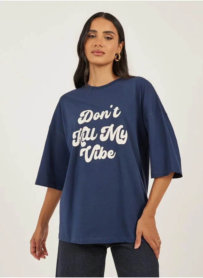 ستايلي Styli Slogan Print Dropped Shoulder Oversized T-Shirt