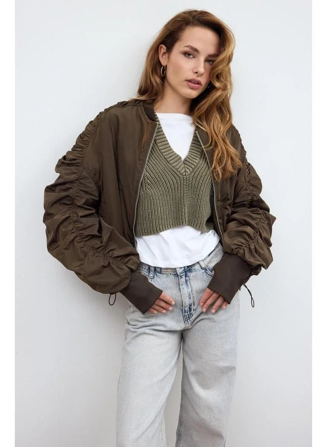 Sherin Khaki Detailed Shoulder and Sleeve Coat.