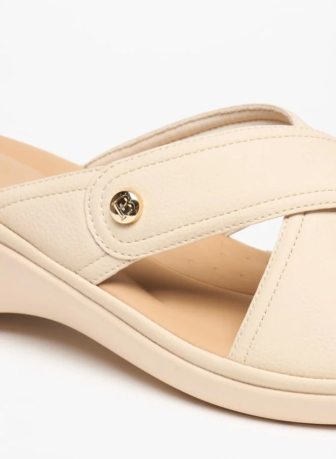 فلورا بيلا من شو إكسبرس Women's Textured Slip-On Cross Strap Sandals with Block Heels