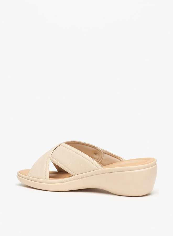 فلورا بيلا من شو إكسبرس Women's Textured Slip-On Cross Strap Sandals with Block Heels