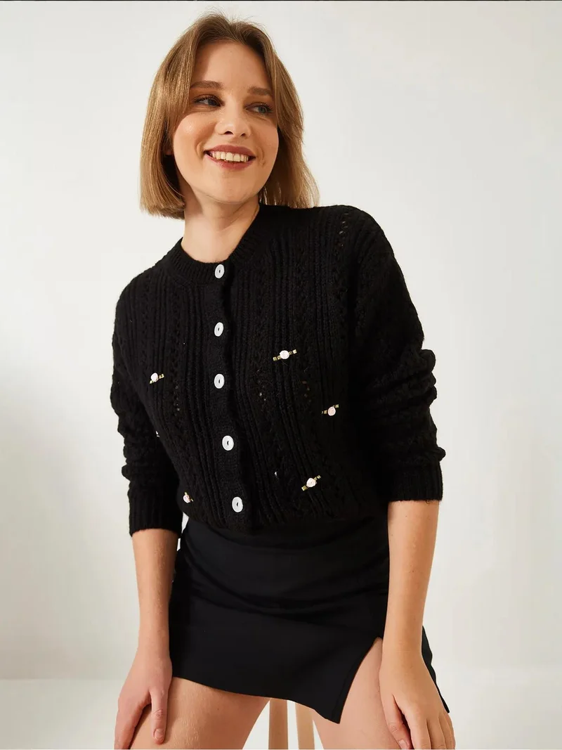 بيانكو لوتشي كارديجان محبوك بنقوش  بأزرار