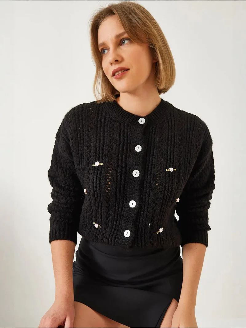 بيانكو لوتشي كارديجان محبوك بنقوش  بأزرار