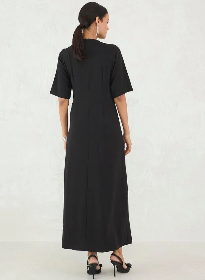 Femmella Femmella Black Solid Twisted Front A-Line Maxi Dress