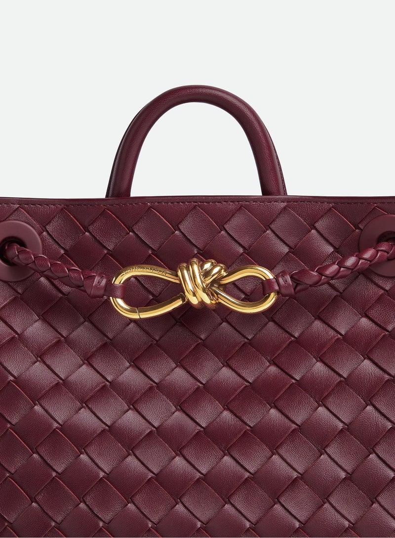 VENETA Andiamo Top handle bag leather bag with signature knot detail and sliding cross-body strap.